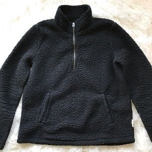 black fleece sweater